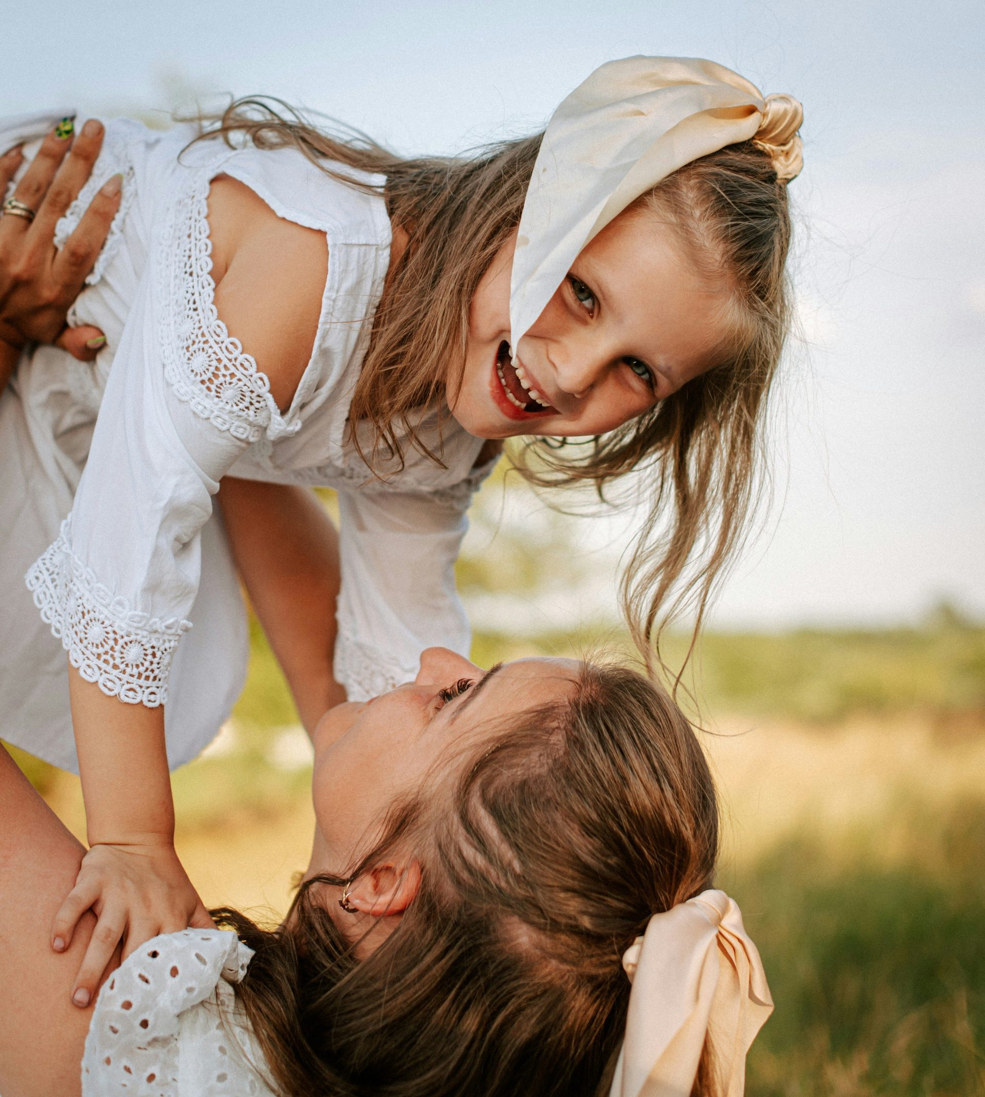 A little girl is playing with a little girl